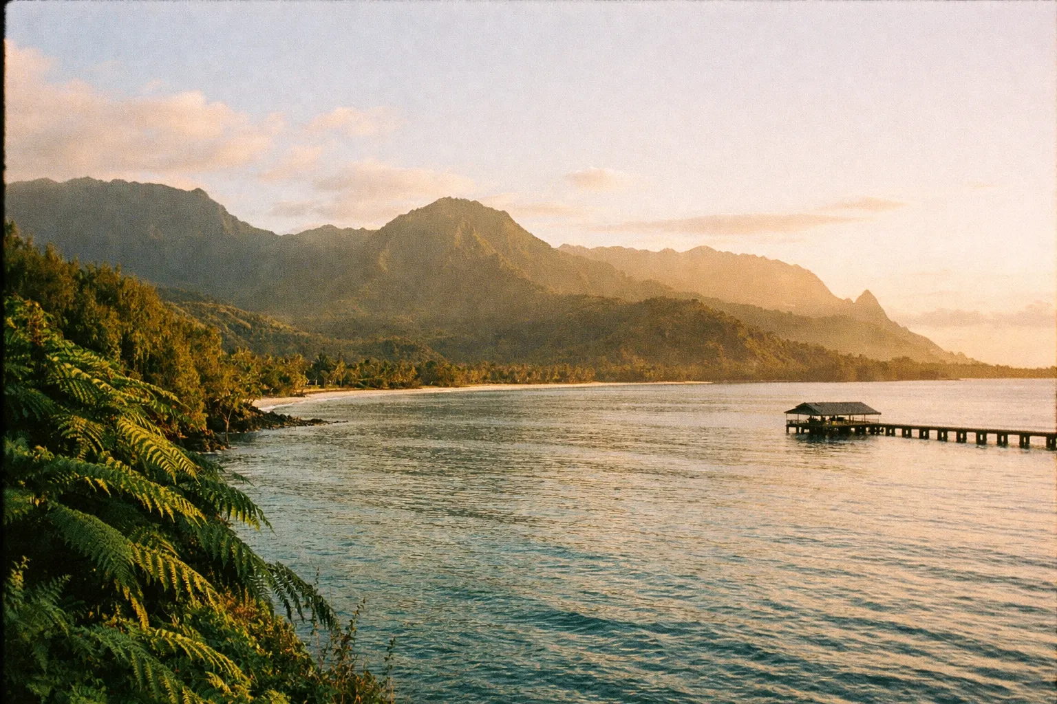 Hanalei Bay at golden hour with Bali Hai peak.
