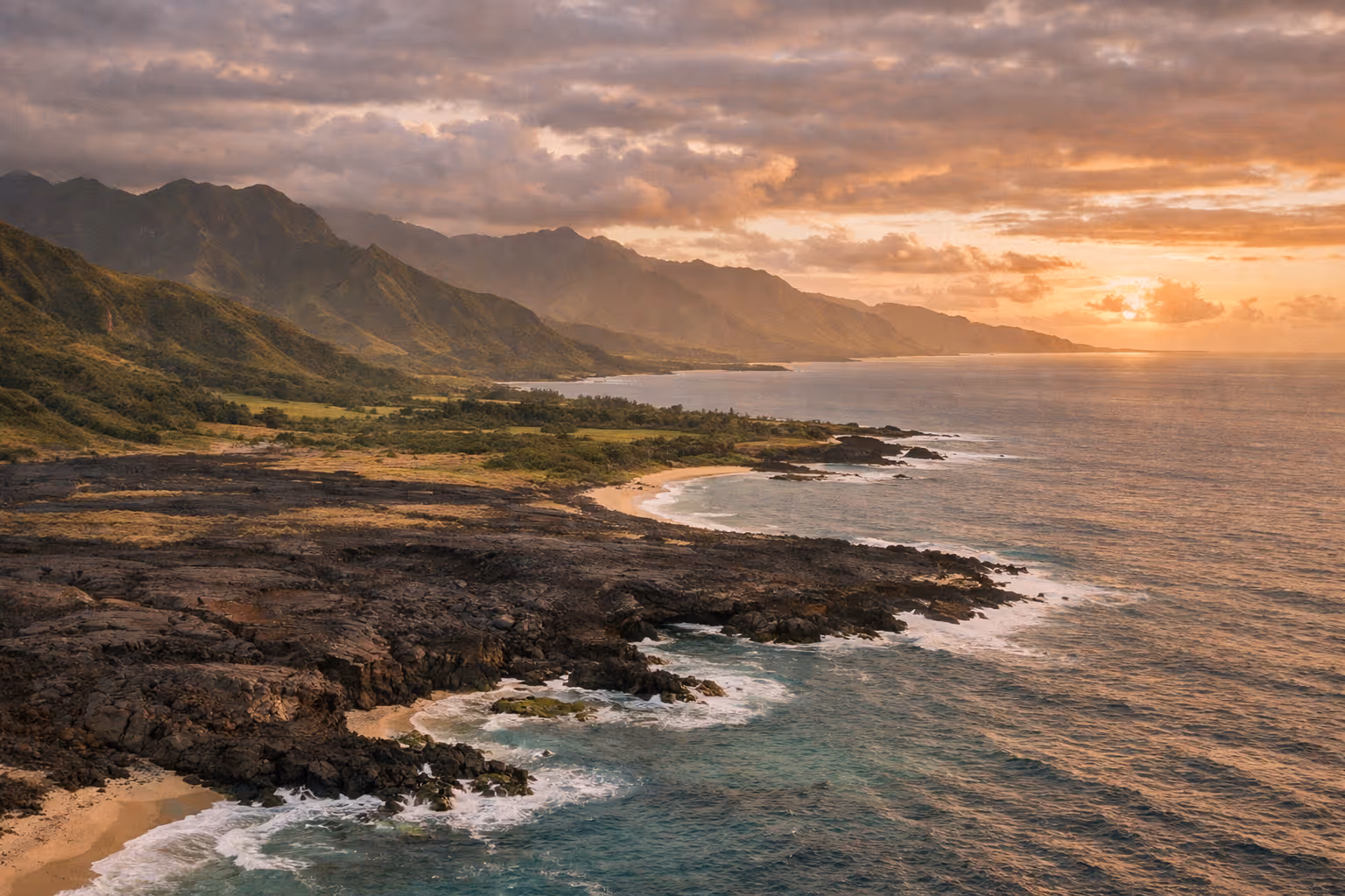 Aerial Hawai'i coastline mosaic with emerald valleys and blue sea at sunset.