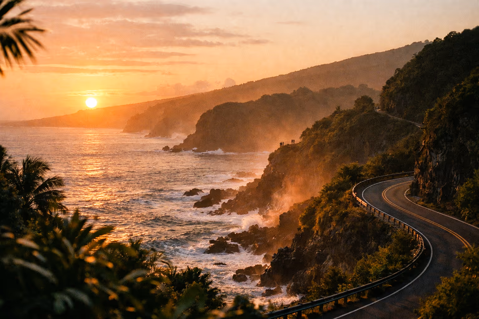 Sunrise over Maui coastline with the Road to Hana winding along the cliffs